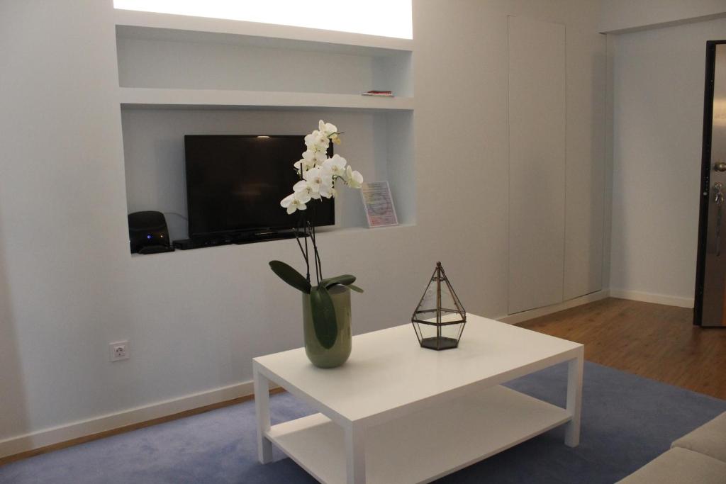 TV a/nebo společenská místnost v ubytování Apartments VMadeira