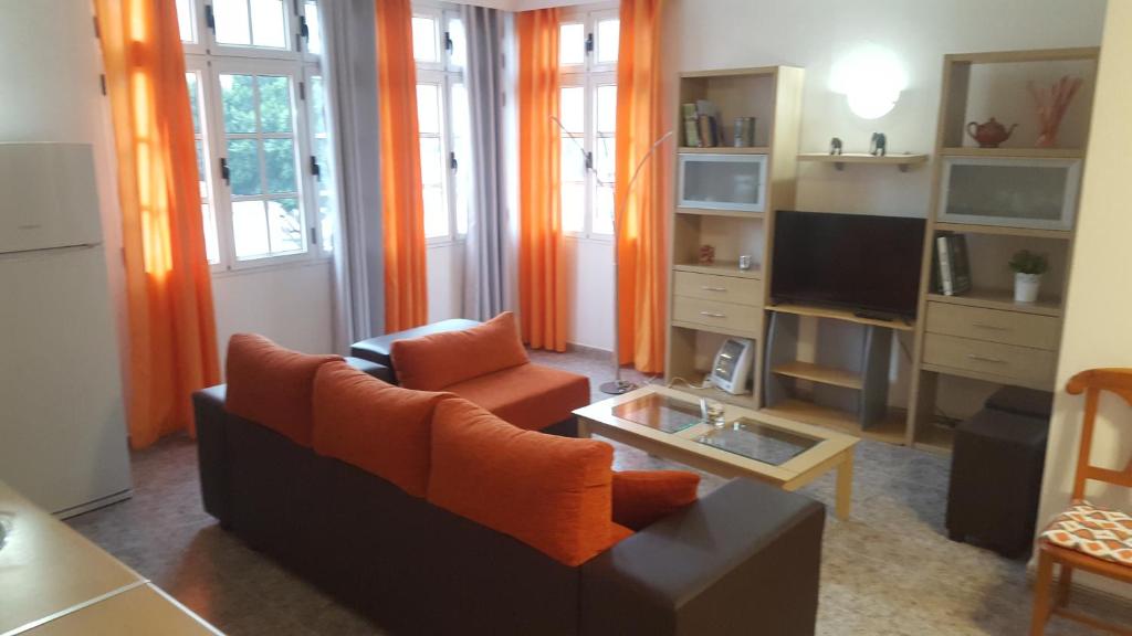 TV a/nebo společenská místnost v ubytování Casa Reyes Fataga