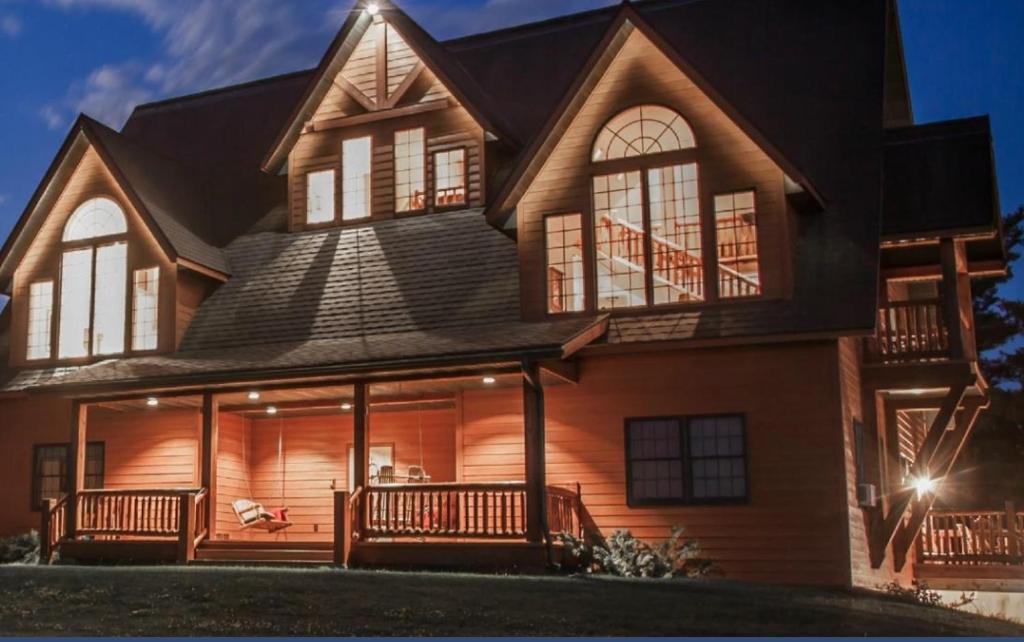 a large house with a gambrel roof at Second Wind Country Inn in Ashland