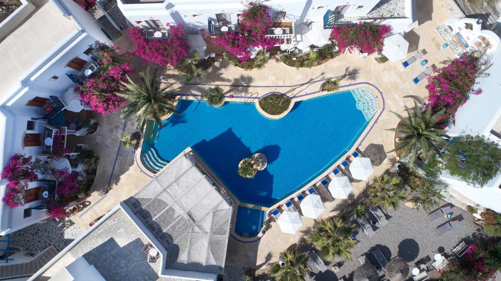 an overhead view of a pool at a resort at Polikandia Hotel in Chora Folegandros