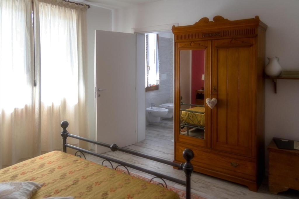 Postel nebo postele na pokoji v ubytování B&B La Rinascita