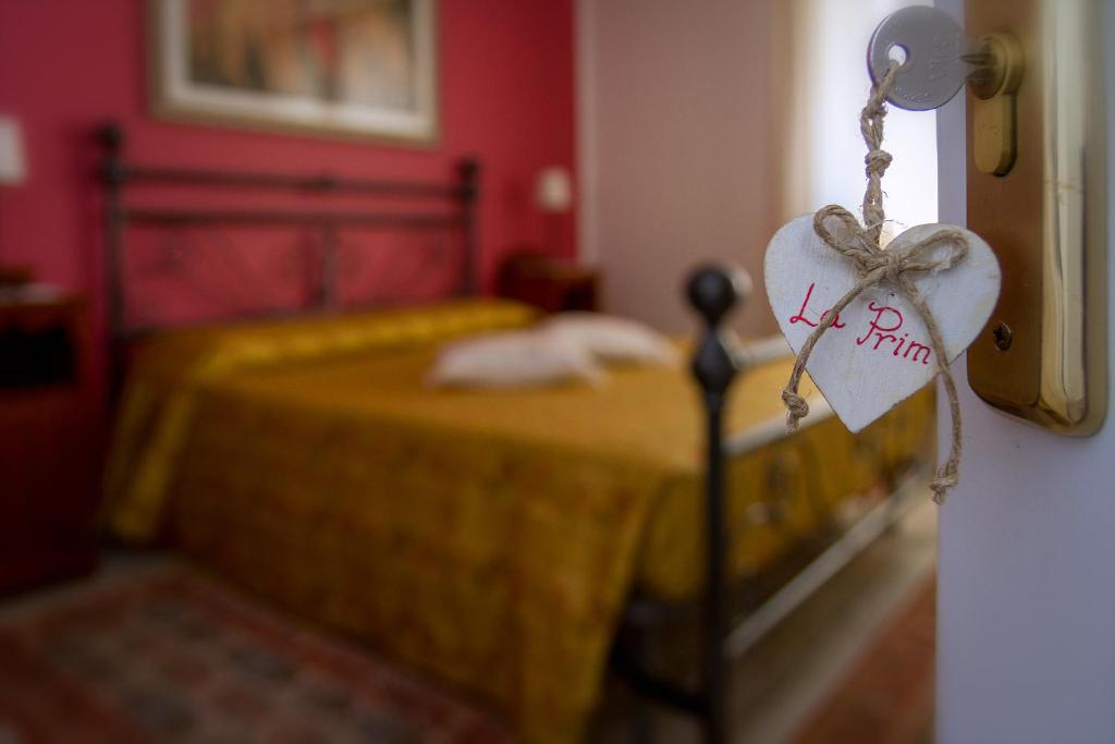 Postel nebo postele na pokoji v ubytování B&B La Rinascita