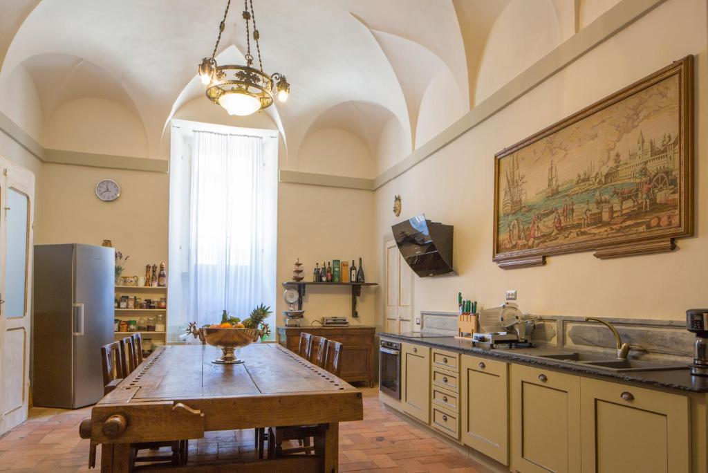 Kuchyň nebo kuchyňský kout v ubytování Palazzo Rotati
