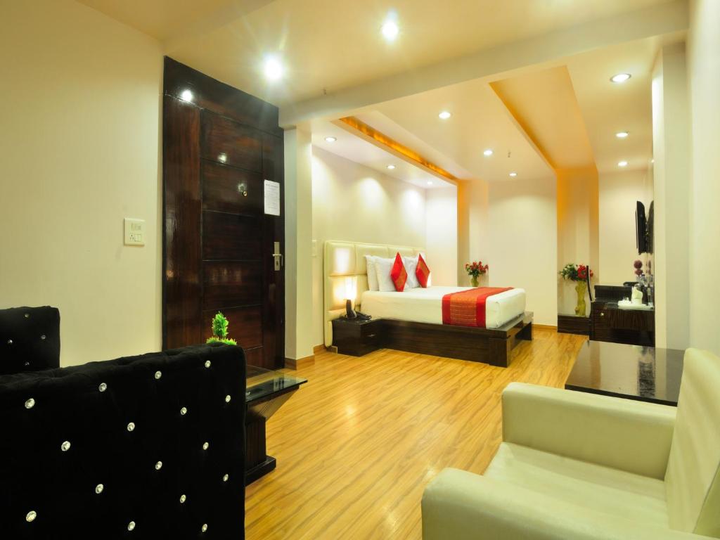 Postel nebo postele na pokoji v ubytování Hotel Elegance