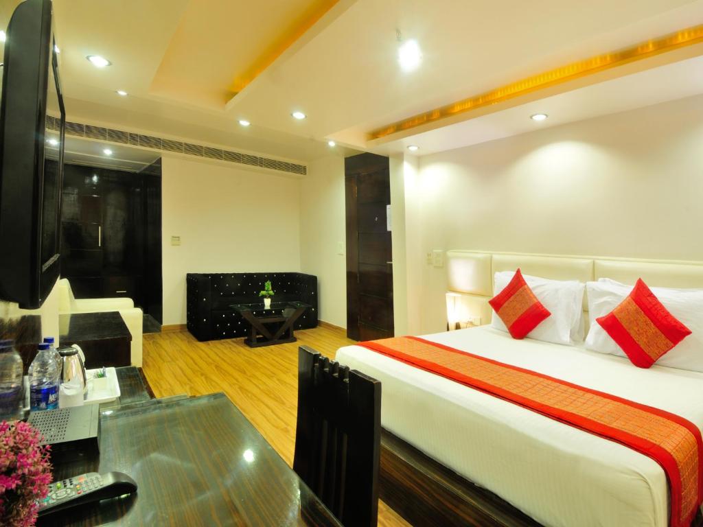 TV a/nebo společenská místnost v ubytování Hotel Elegance