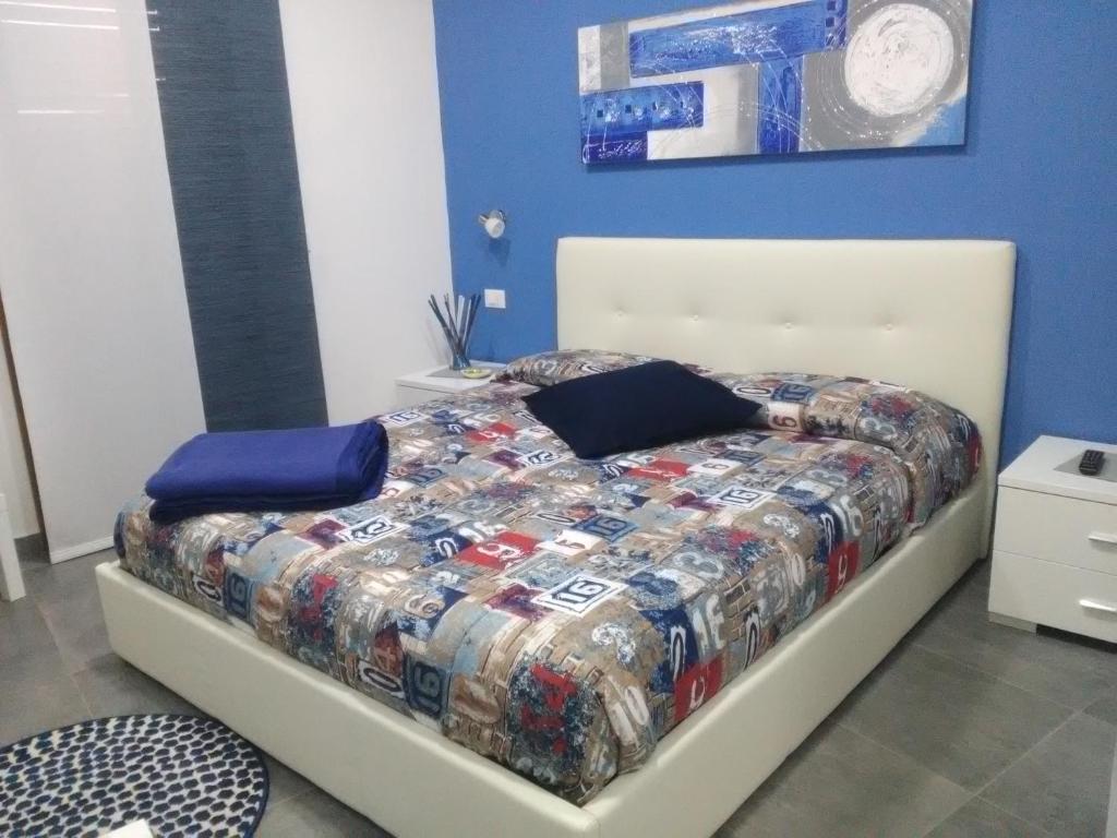 Letto o letti in una camera di B&B La Grotta