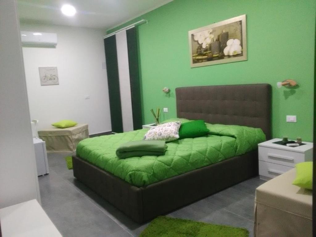 Letto o letti in una camera di B&B La Grotta