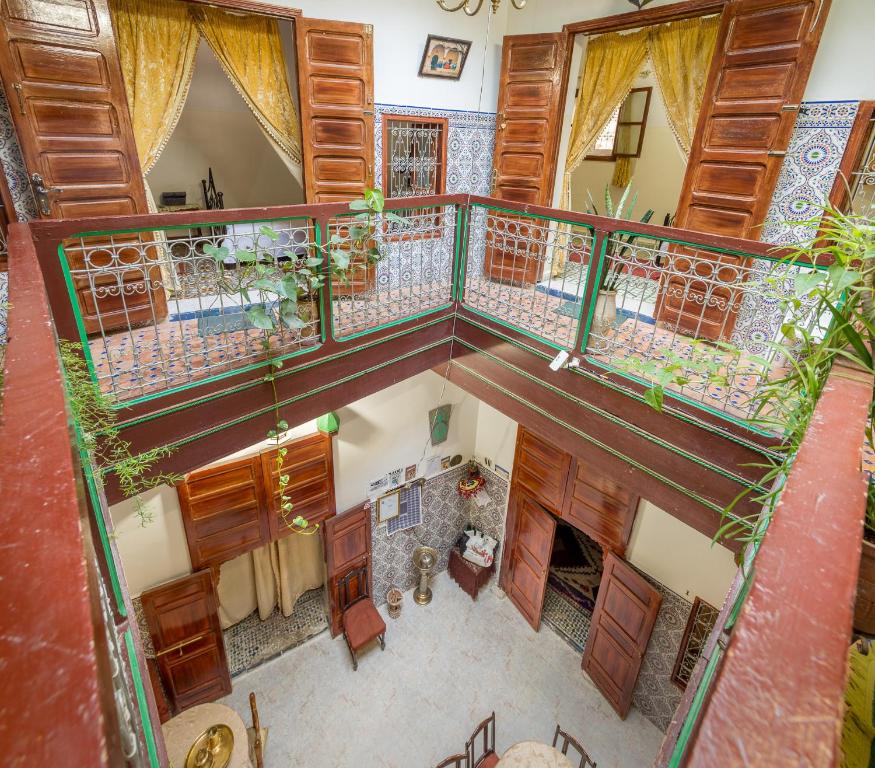 an overhead view of a house with a balcony at La Colombe Blanche in Moulay Idriss Zerhoun