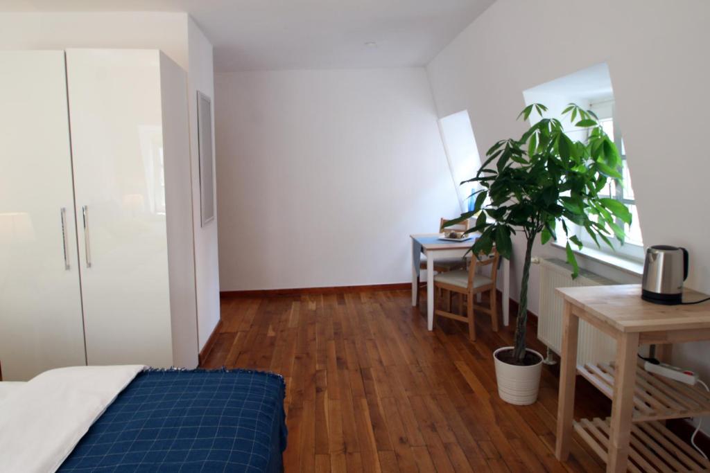 Postel nebo postele na pokoji v ubytování Hotel Sudpfanne