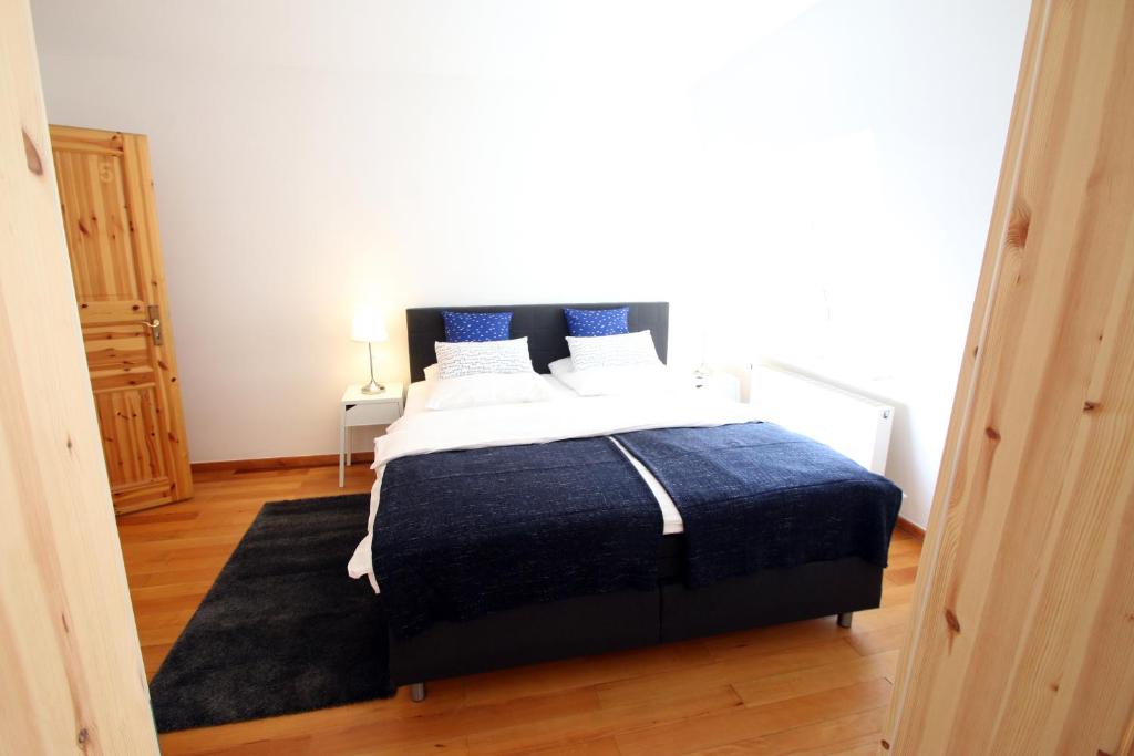 Postel nebo postele na pokoji v ubytování Hotel Sudpfanne