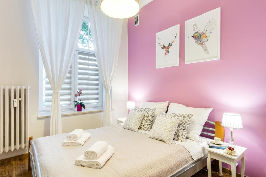 Posteľ alebo postele v izbe v ubytovaní Długa Comfort Apartments