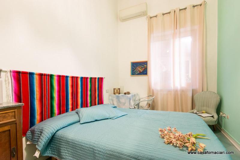 Posteľ alebo postele v izbe v ubytovaní Casa Fornaciari