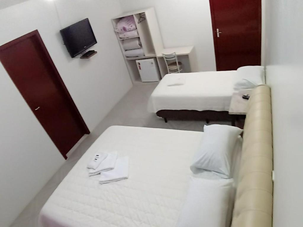 Postel nebo postele na pokoji v ubytování Giroto Hotel