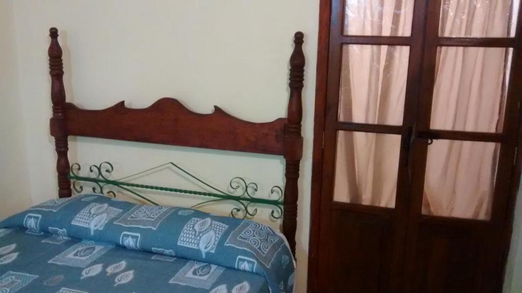 Postel nebo postele na pokoji v ubytování Real Bonanza Posada