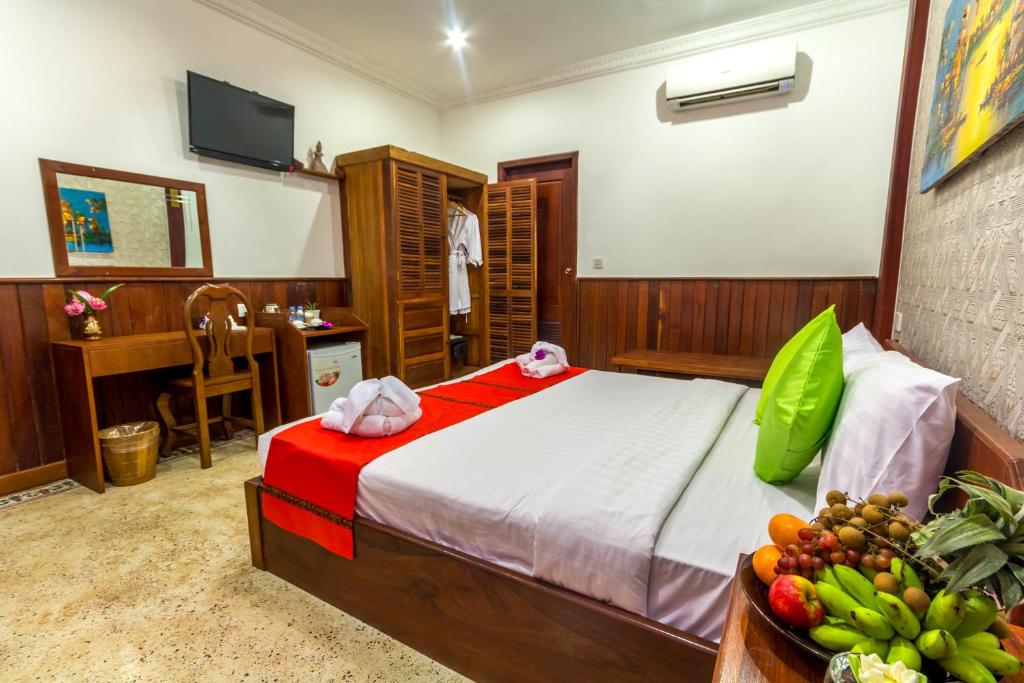 Postel nebo postele na pokoji v ubytování BayStone Resort