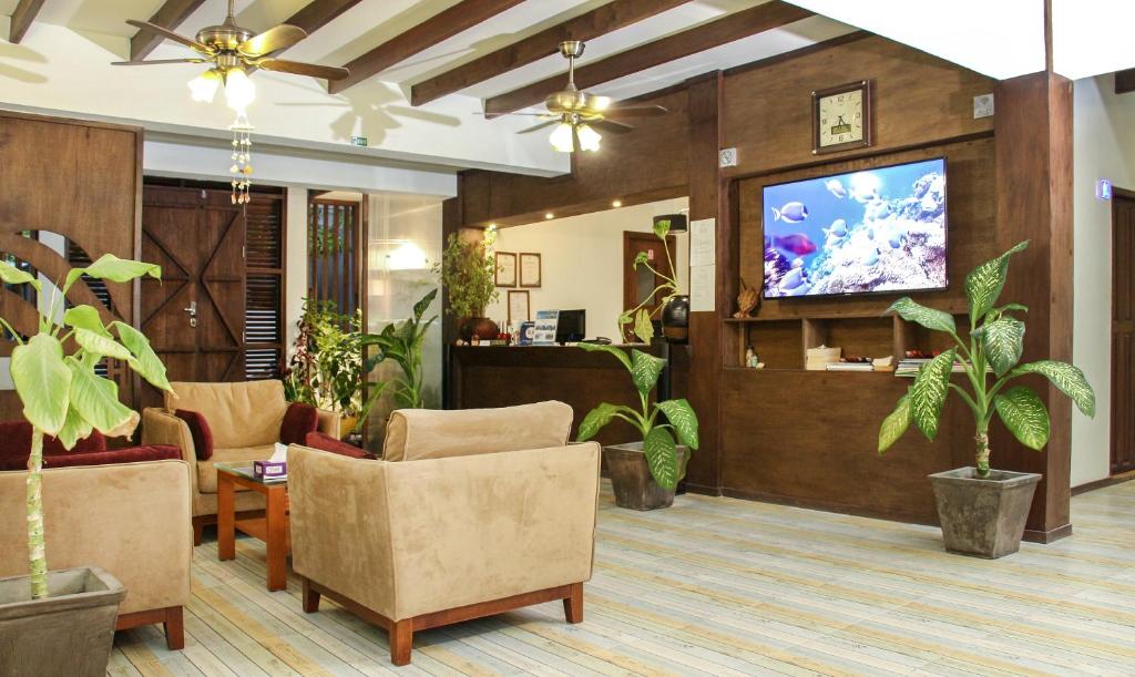 TV a/nebo společenská místnost v ubytování Salt Beach Hotel