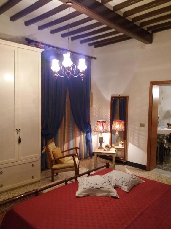 Postel nebo postele na pokoji v ubytování Casa Tarrini
