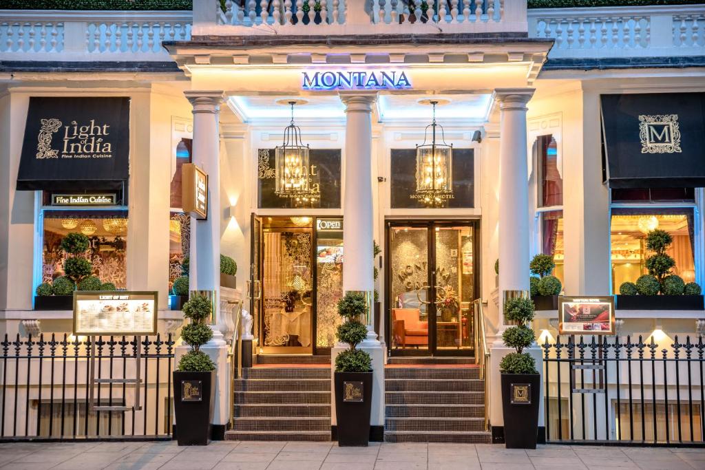 a store front of a shopping mall with a womanma at The Montana Hotel in London