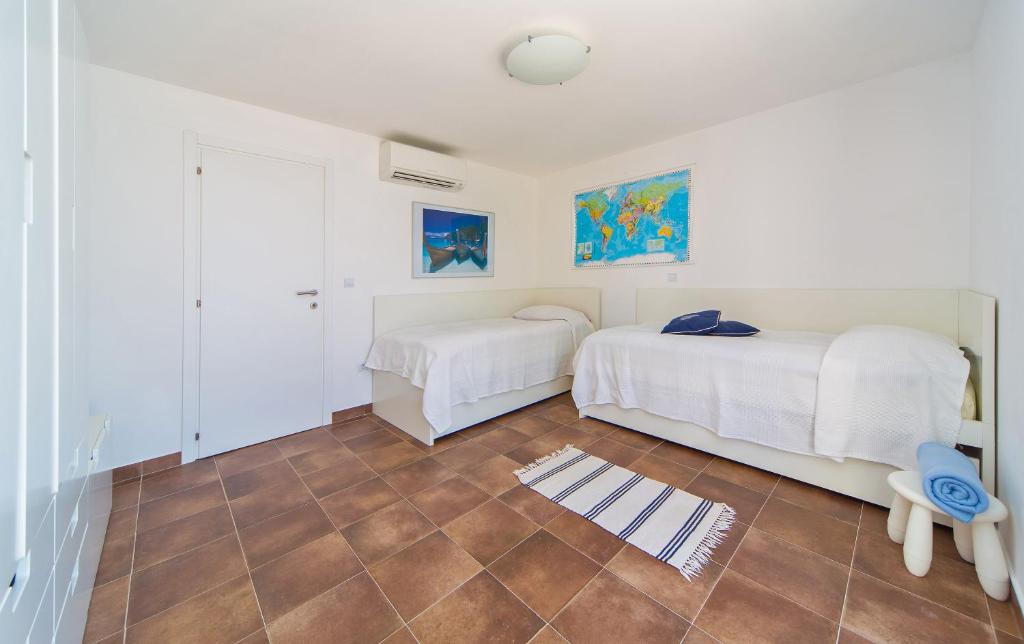 Posteľ alebo postele v izbe v ubytovaní I Sassi Bianchi - West Villa