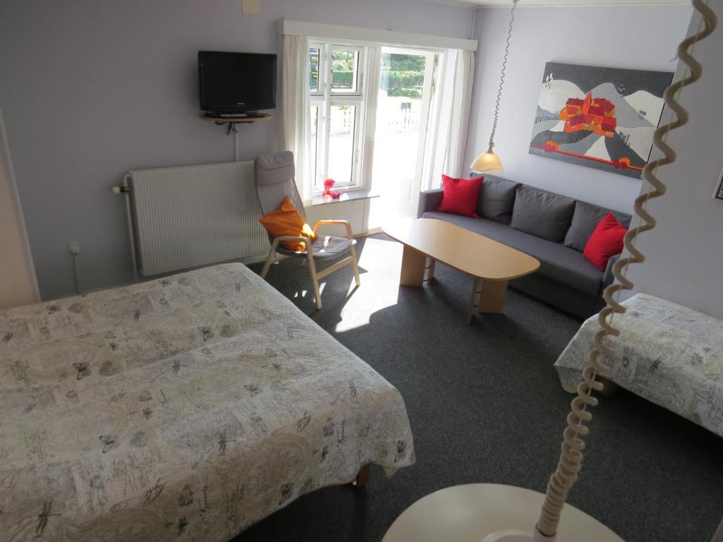 Postel nebo postele na pokoji v ubytování Motel Garni Blåvand