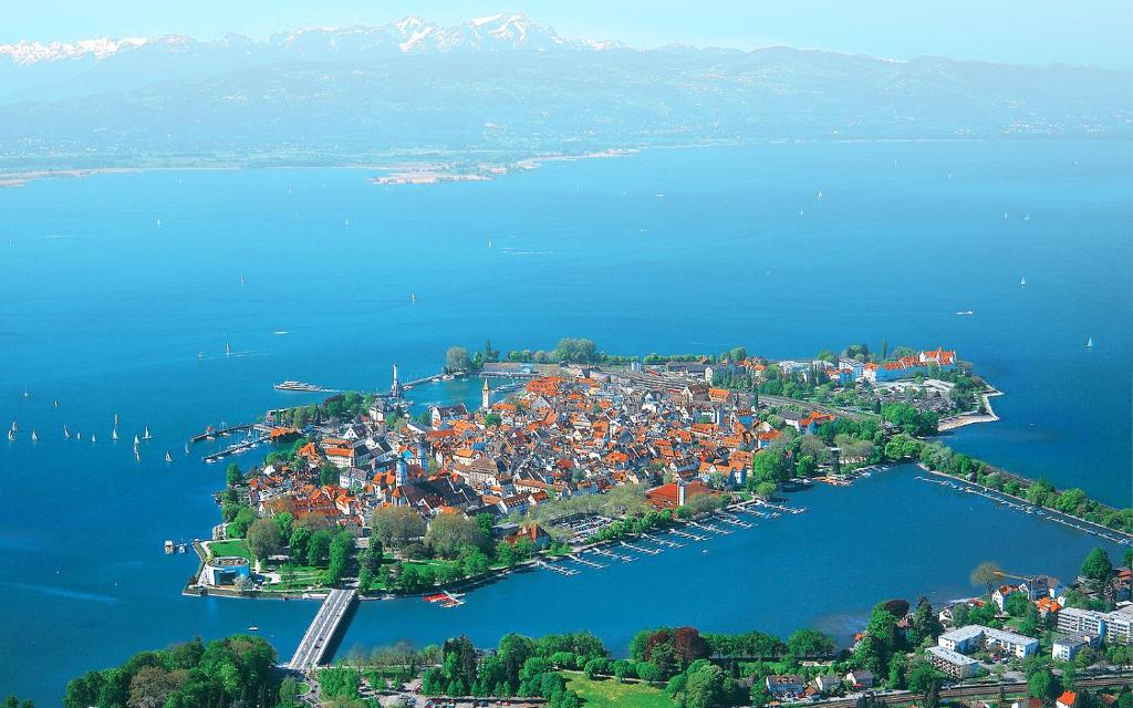 an aerial view of a small town on an island in the water at Gästezimmer Hozici in Lindau