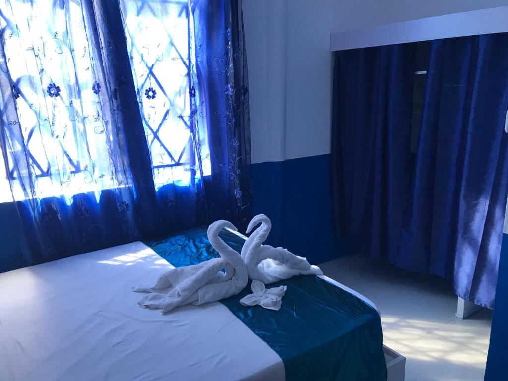 Postel nebo postele na pokoji v ubytování Eden Villa