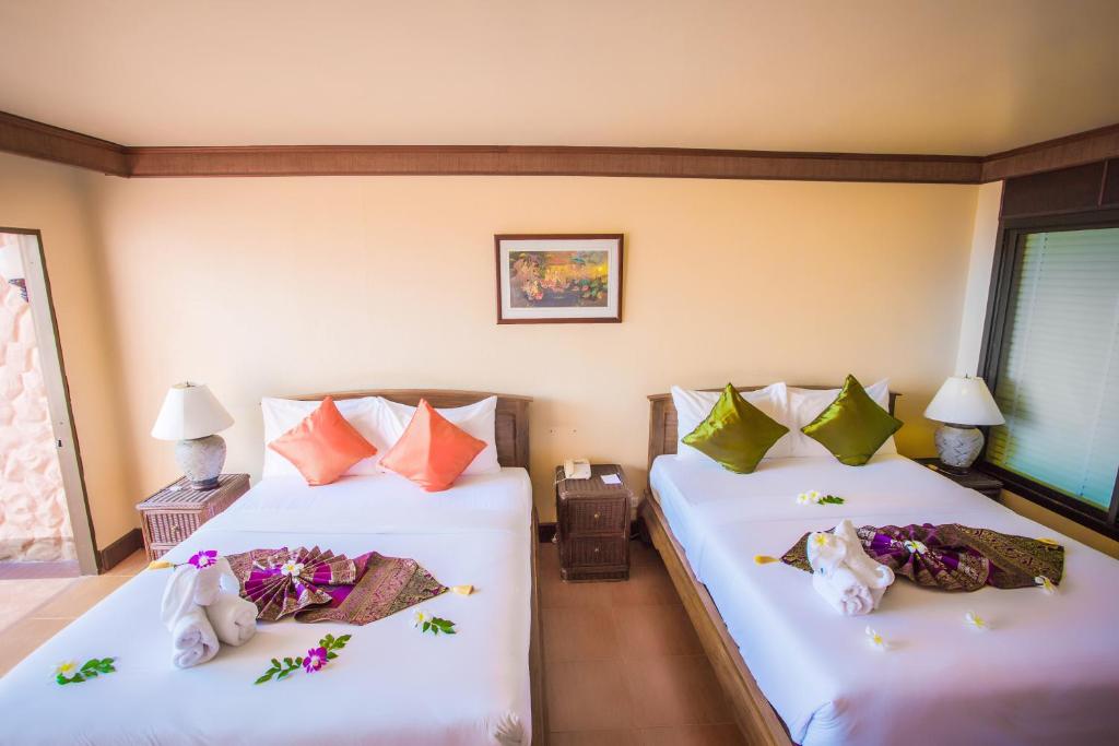 Postel nebo postele na pokoji v ubytování Samui Bayview Resort & Spa - SHA Plus