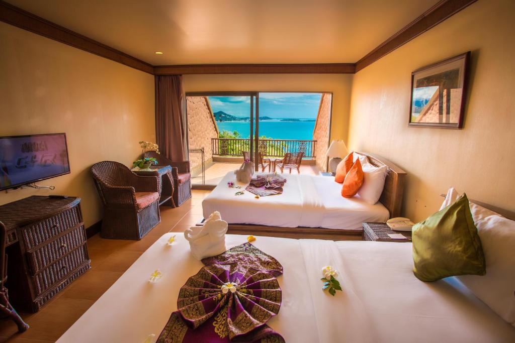 Postel nebo postele na pokoji v ubytování Samui Bayview Resort & Spa - SHA Plus