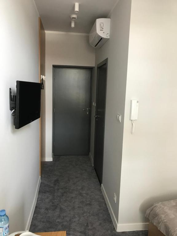 TV a/nebo společenská místnost v ubytování 7 Rooms MTP