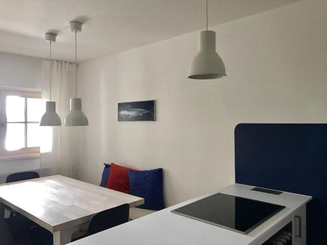 A bed or beds in a room at See-Apartment Weiden