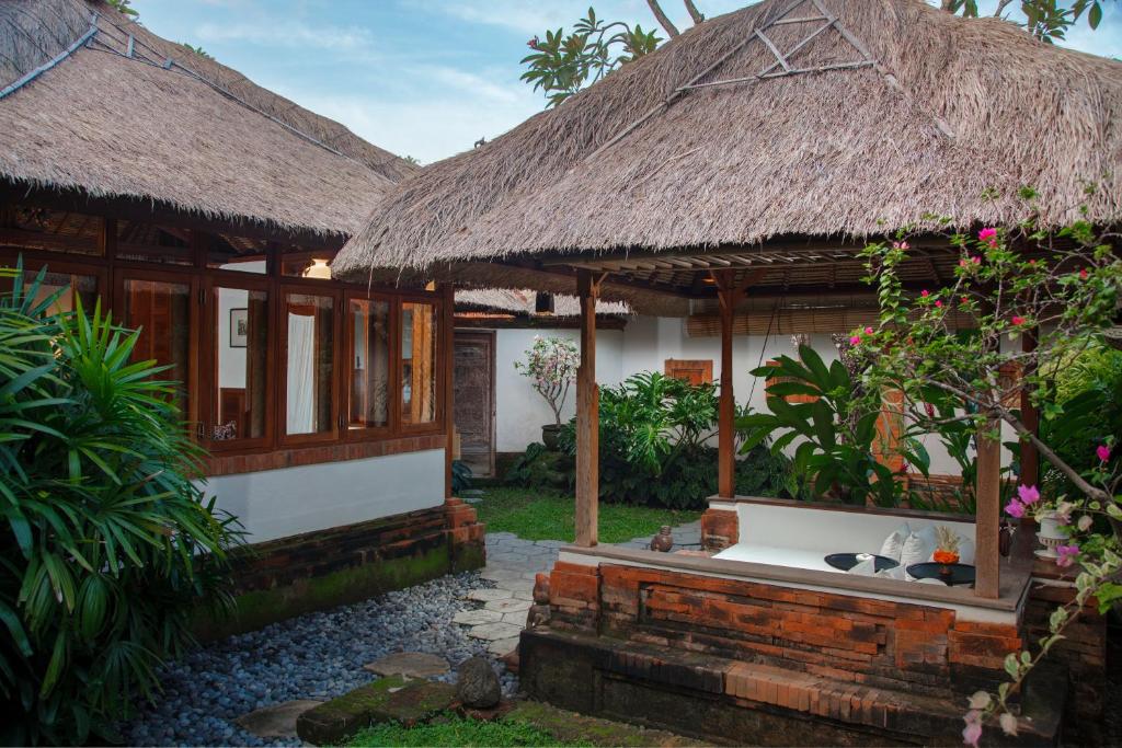 Zahrada ubytování Tandjung Sari Hotel