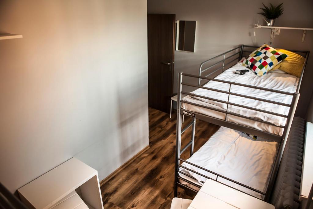 Postel nebo postele na pokoji v ubytování Za Murami Hostel