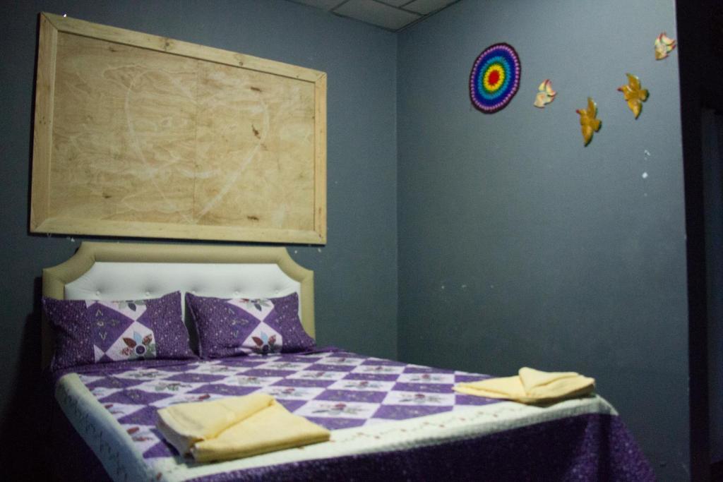 Postel nebo postele na pokoji v ubytování Sook Jai Guest House