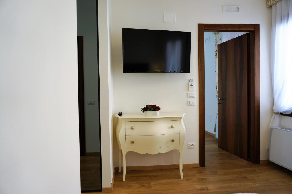 TV a/nebo společenská místnost v ubytování B&B HORTUS