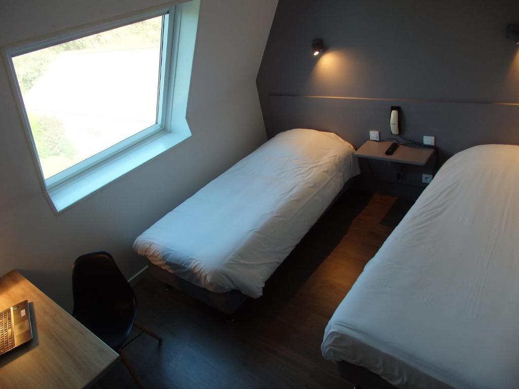 Postel nebo postele na pokoji v ubytování Hotel Castel