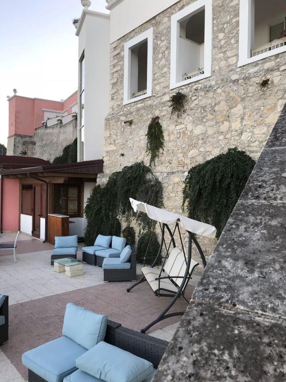 Uma área de estar em Hotel Boutique Il Castellino Relais