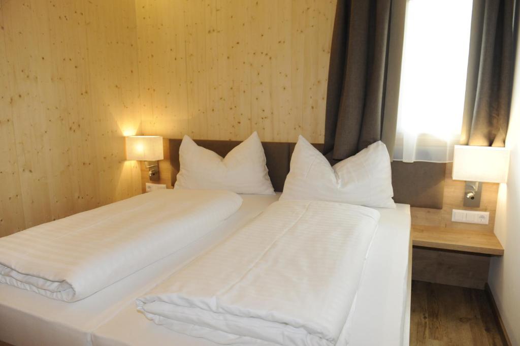 Posteľ alebo postele v izbe v ubytovaní Premium Appartements Sonnenbahn