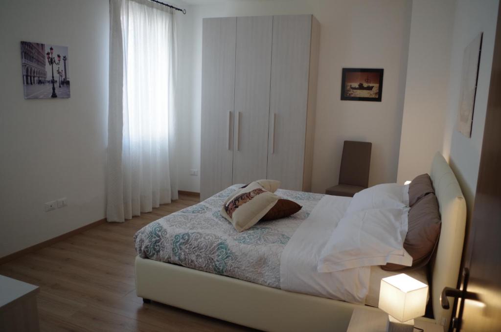 Postel nebo postele na pokoji v ubytování Alla Torre B&B