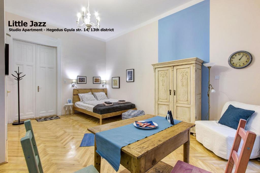 Posteľ alebo postele v izbe v ubytovaní Little Americas Concert Hall Apartments