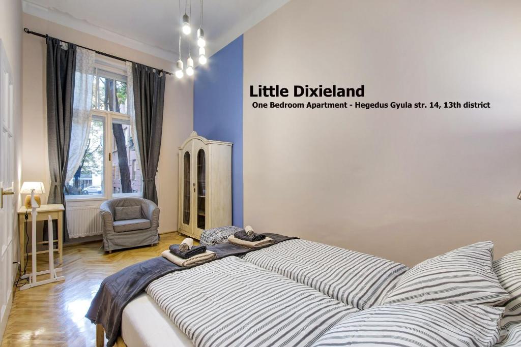 Posteľ alebo postele v izbe v ubytovaní Little Americas Concert Hall Apartments