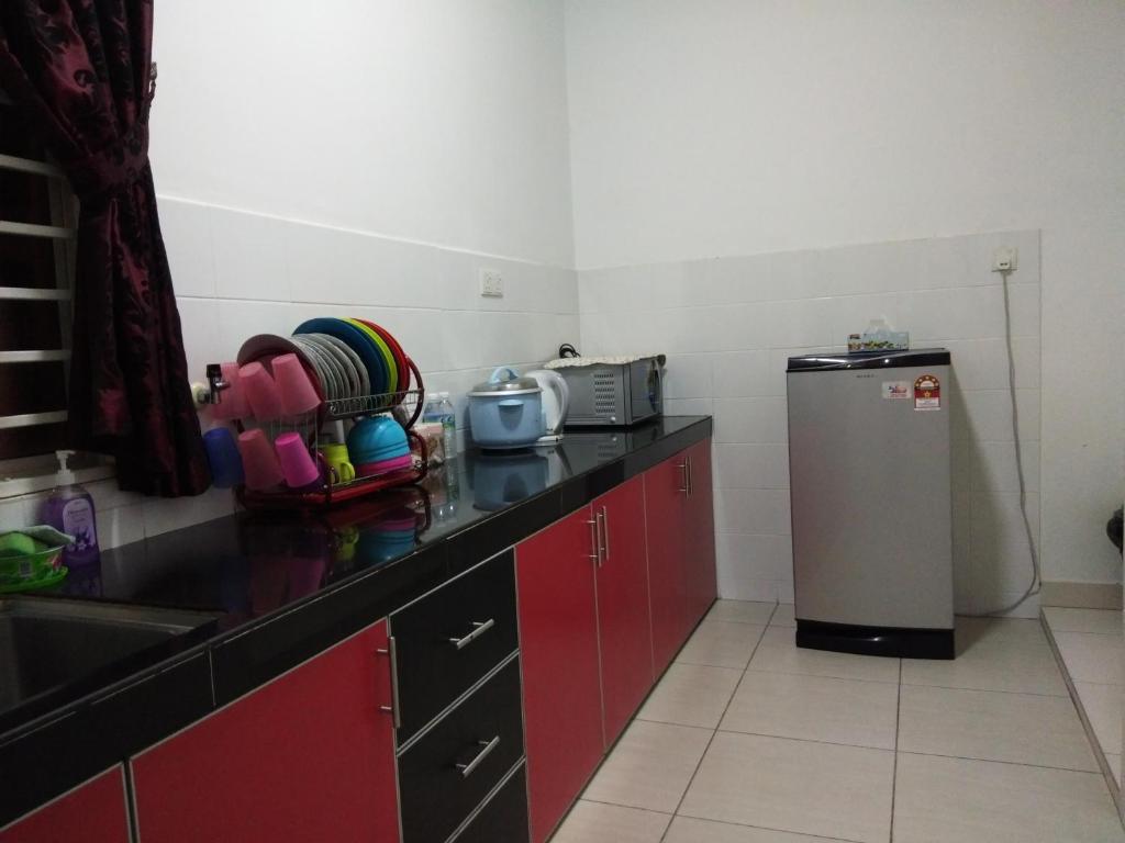 Kuchyň nebo kuchyňský kout v ubytování Masayu Putrajaya Homestay
