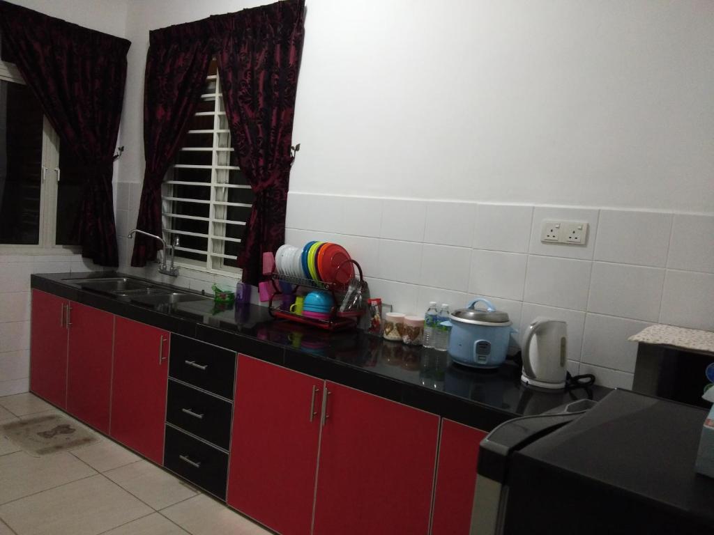 Kuchyň nebo kuchyňský kout v ubytování Masayu Putrajaya Homestay