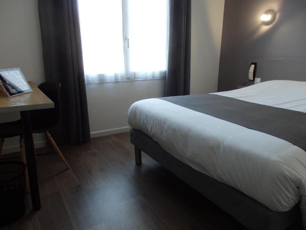 Postel nebo postele na pokoji v ubytování Hotel Castel