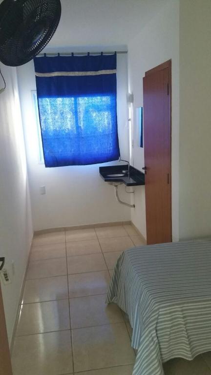 Postel nebo postele na pokoji v ubytování Pousada Majestic
