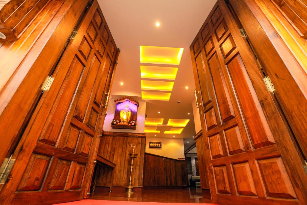 Kuchyň nebo kuchyňský kout v ubytování Roses Inn Fortkochi