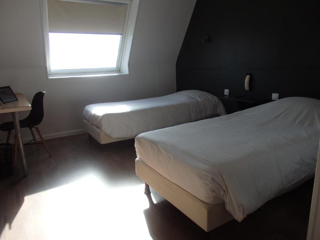 Postel nebo postele na pokoji v ubytování Hotel Castel
