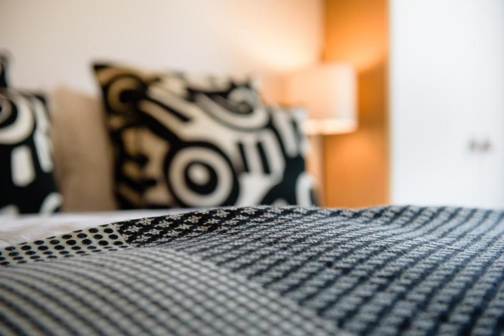 Postel nebo postele na pokoji v ubytování Les Chambres de Martin