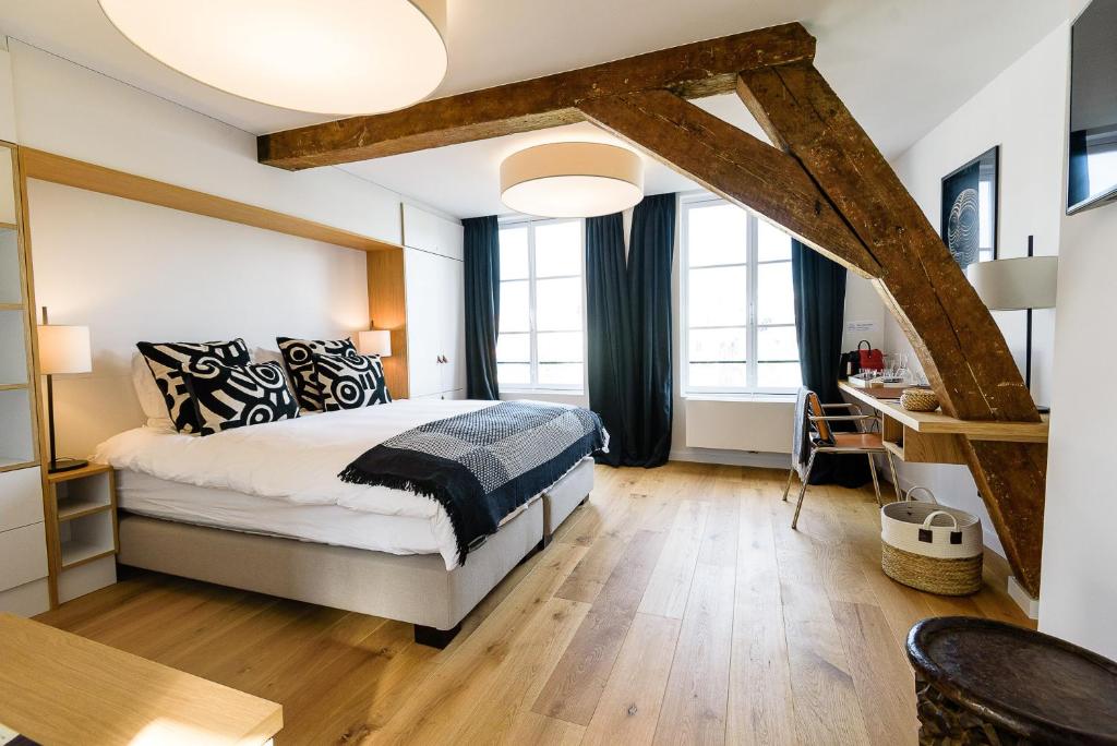 Postel nebo postele na pokoji v ubytování Les Chambres de Martin