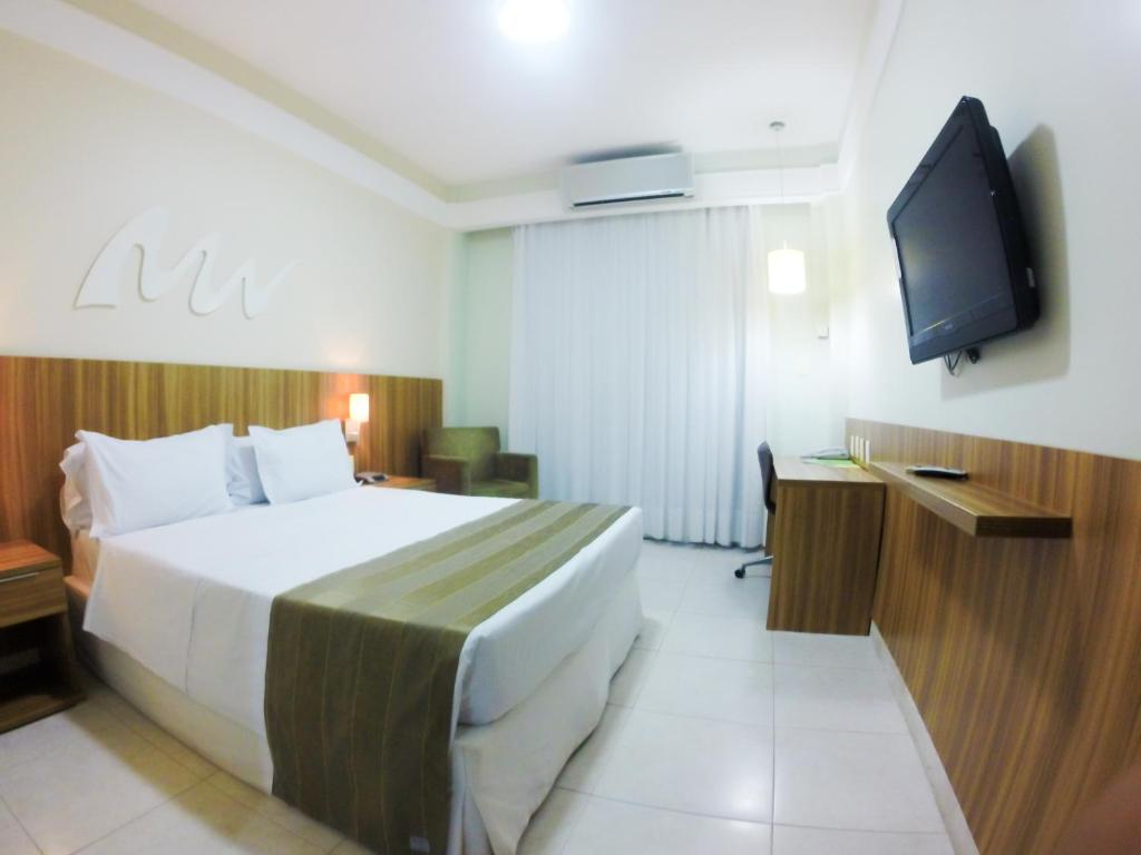 Postel nebo postele na pokoji v ubytování Real Classic Hotel