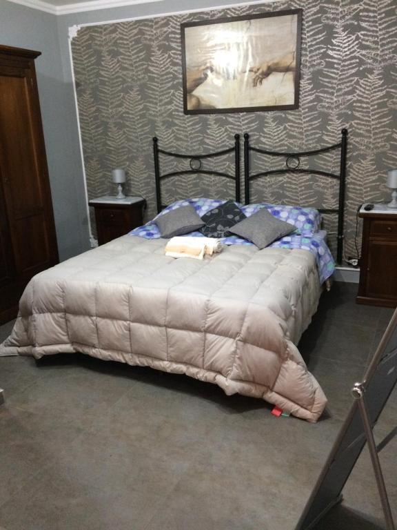 Posteľ alebo postele v izbe v ubytovaní Sicily Center rooms -Calascibetta,Enna-